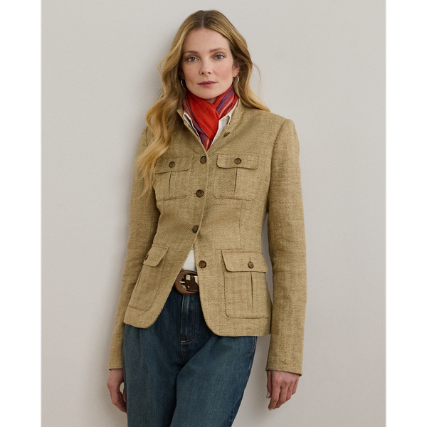A sophisticated layer, this jacket unites a textured herringbone linen construction with surplus-inspired design elements, including a band collar, signature horn-effect buttons and box-pleated patch pockets.