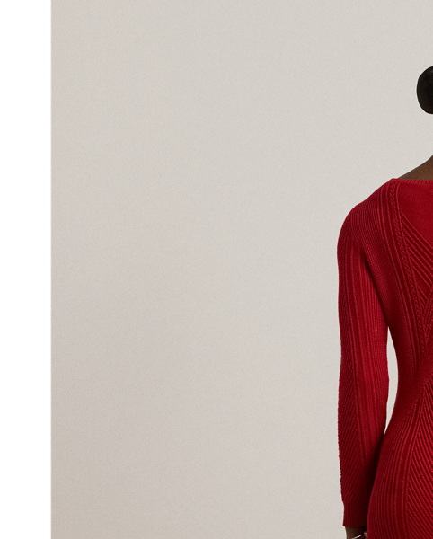 With a slim-fitting silhouette and a graceful boatneck, this jumper dress is pointelle-knit with a soft cotton blend for subtle dimension.