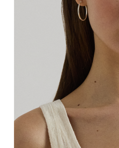 A classic rib-knit construction brings subtle texture to this jumper tank top, which is crafted from a lightweight linen blend for a soft hand feel.