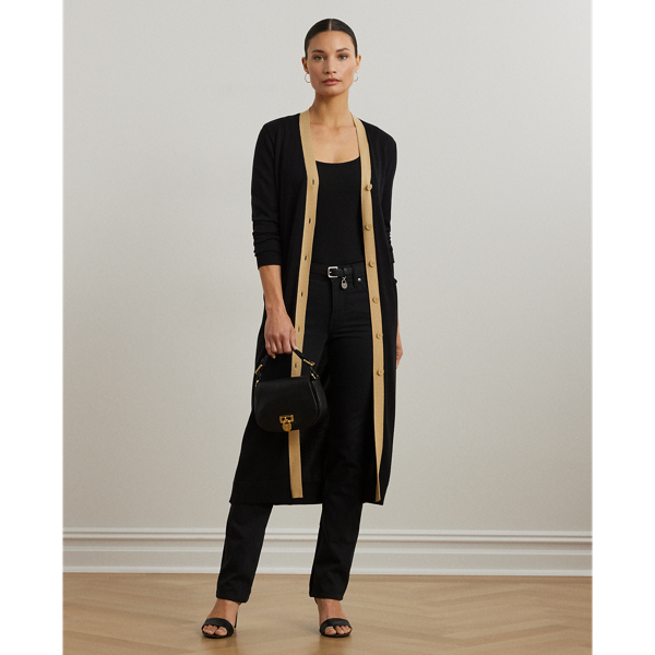 Crafted with a soft combed cotton blend, this calf-grazing cardigan showcases a two-tone design for a modern, sophisticated sensibility.