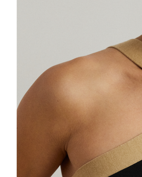 Modern sophistication defines this cotton-blend jumper tank top, which features a crisscross halter-style neckline, a two-tone design and a slim silhouette.