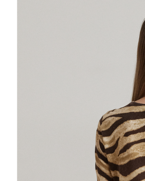 Perfect for transitional dressing thanks to its short-sleeve design and lightweight linen-and-cotton fabrication, this jumper is enlivened by the season's eye-catching zebra motif.