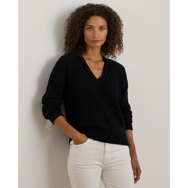 Crafted with ultrasoft combed cotton, this monochromatic version of Lauren  Ralph Lauren Lauren's iconic cricket jumper features a cable-knit body detailed with delicate pointelle stitching along the neckline.