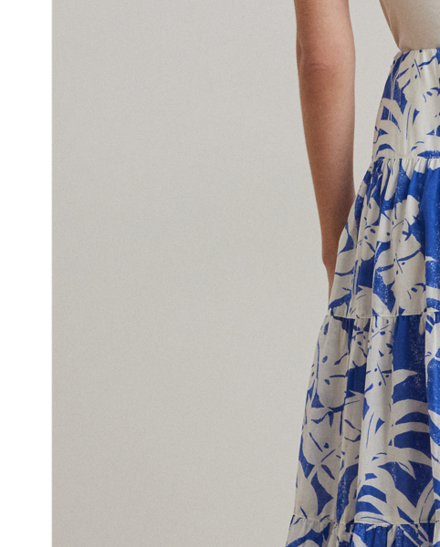 Showcasing the season's palm-frond print in hues of white and blue, this A-line skirt unites lightweight cotton voile with a tiered construction for effortless movement with each step.