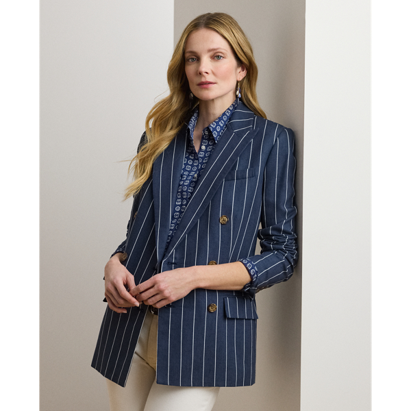 An enduring layering piece, this double-breasted blazer is crafted from a herringbone linen blend for subtle texture and a lightweight feel. Shoulder pads, waist darts and panel seams accentuate its streamlined silhouette, while peak lapels and signature horn-effect buttons add a sophisticated finish.