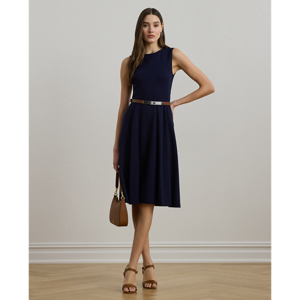 Straddle-stitched princess seams accentuate the fit-and-flare silhouette of this sleeveless dress, which is crafted with smooth, stretch-infused ponte.