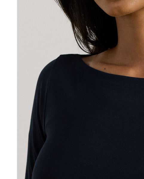 An enduring wardrobe essential, this boatneck midi dress with elbow-length sleeves is rib-knit with breathable stretch cotton for a comfortable fit and feel.