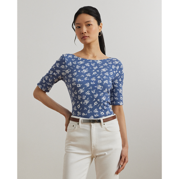 Made from breathable stretch cotton for a soft hand feel, this version of Lauren  Ralph Lauren Lauren's essential boatneck T-shirt is refreshed for the season with an enchanting, two-tone floral motif. An “LRL”-embroidered logo on the hem adds a subtle signature finish.