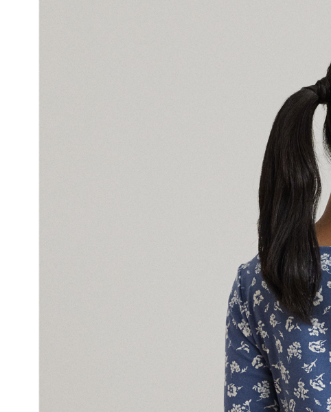 Made from breathable stretch cotton for a soft hand feel, this version of Lauren  Ralph Lauren Lauren's essential boatneck T-shirt is refreshed for the season with an enchanting, two-tone floral motif. An “LRL”-embroidered logo on the hem adds a subtle signature finish.