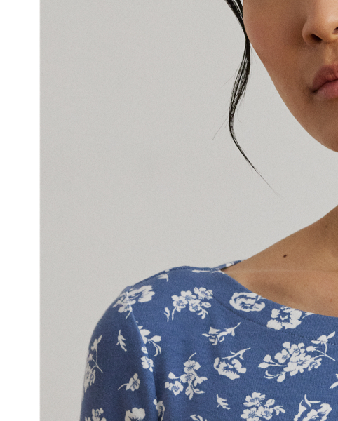 Made from breathable stretch cotton for a soft hand feel, this version of Lauren  Ralph Lauren Lauren's essential boatneck T-shirt is refreshed for the season with an enchanting, two-tone floral motif. An “LRL”-embroidered logo on the hem adds a subtle signature finish.