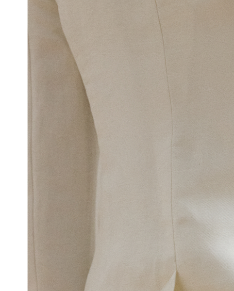 Shoulder pads, princess seams and waist darts enhance the streamlined silhouette of this blazer, which is crafted with airy linen-blend twill. Signature horn-effect buttons provide added sophistication.