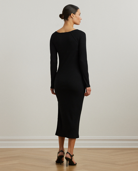 An enduring wardrobe staple, this long-sleeve dress features a square neckline, a figure-skimming sheath silhouette and a dimensional rib-knit construction. It's finished with a slit on the skirt for ease of movement.