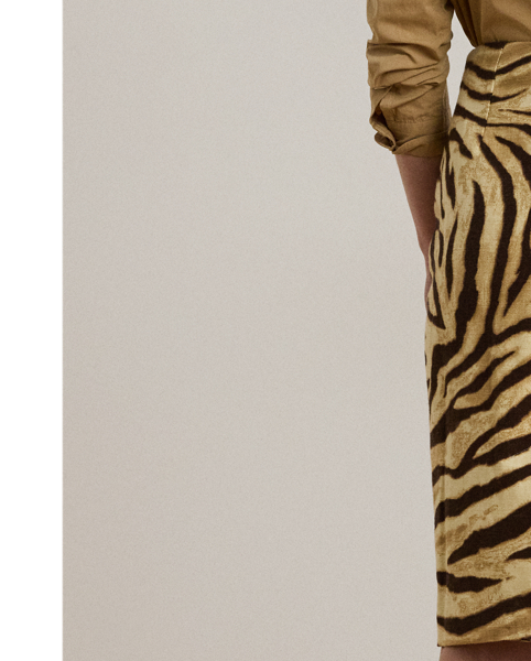 Lauren  Ralph Lauren Lauren's eye-catching rendition of the quintessential pencil skirt features a lightweight linen-and-cotton blend and the season's zebra print.