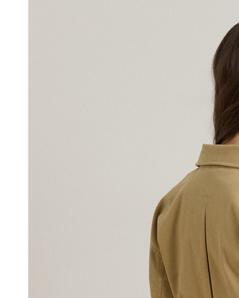 Crafted with double-faced stretch cotton, this field jacket features a myriad of patch pockets, a belted waist and signature horn-effect buttons.