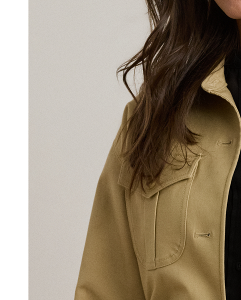 Crafted with double-faced stretch cotton, this field jacket features a myriad of patch pockets, a belted waist and signature horn-effect buttons.