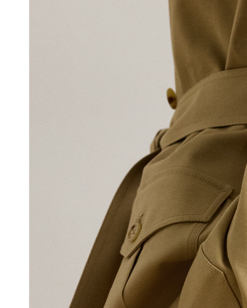 Crafted with double-faced stretch cotton, this field jacket features a myriad of patch pockets, a belted waist and signature horn-effect buttons.