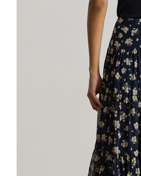 Displaying the season's feminine, two-tone floral print, this A-line skirt unites lightweight crinkle georgette with a tiered construction for graceful movement with each step.