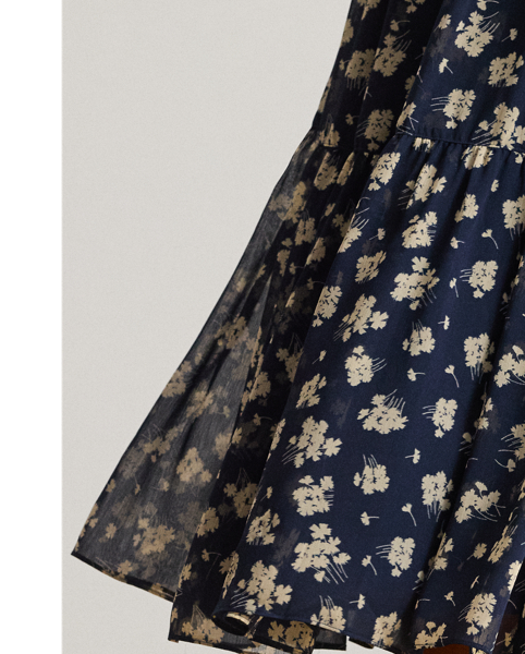 Displaying the season's feminine, two-tone floral print, this A-line skirt unites lightweight crinkle georgette with a tiered construction for graceful movement with each step.