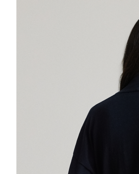 Elegant and cosy, this relaxed-fitting jumper unites a surplice design with a soft cotton-and-modal blend.