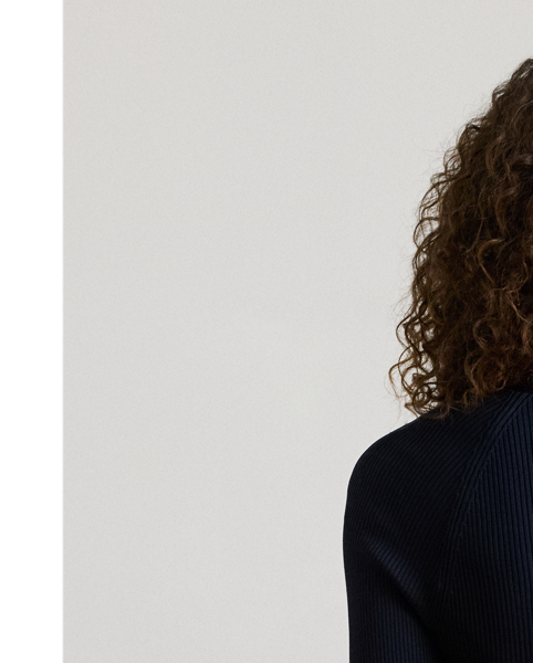 Modern elegance defines this jumper, which features a rib-knit construction, a square neckline and an equestrian-inspired buckle embellishment at the left shoulder.