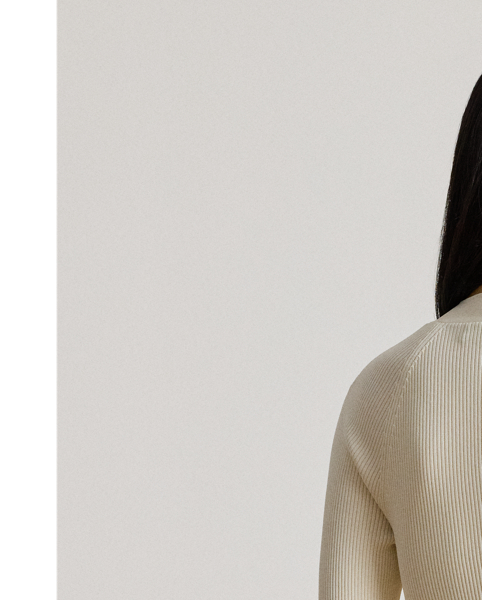 Modern elegance defines this jumper, which features a rib-knit construction, a square neckline and an equestrian-inspired buckle embellishment at the left shoulder.