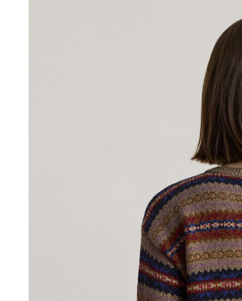 Crafted from a soft blend of cotton and linen, this relaxed-fitting V-neck jumper displays a classic Fair Isle pattern.