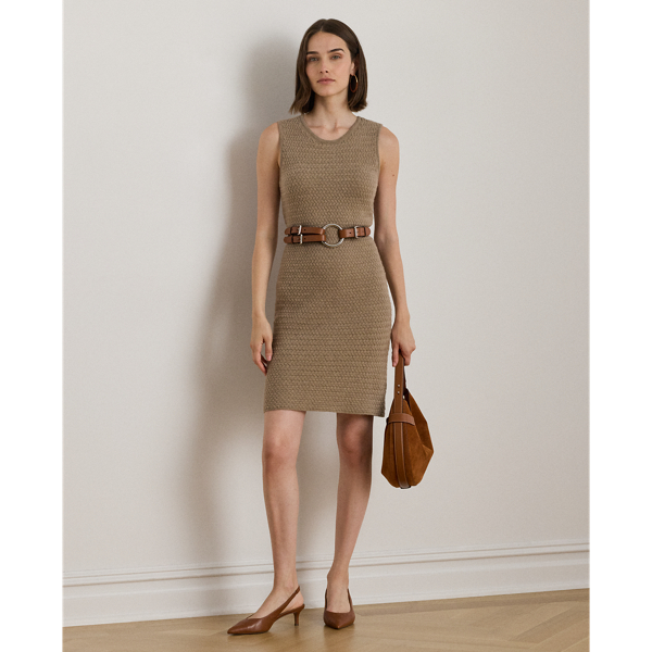The slim-fitting silhouette of this sleeveless jumper dress is basket-woven with a wool blend, creating an inviting texture and a luxuriously soft hand feel.