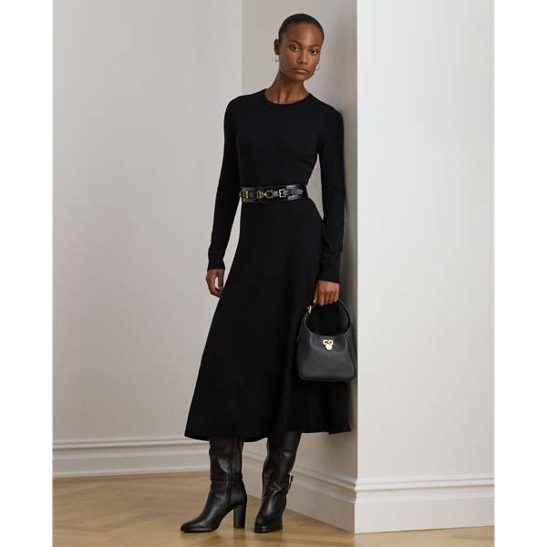 A timeless addition to your cool-weather wardrobe, this crewneck jumper dress features a midi-length A-line silhouette rendered in soft, worsted wool.