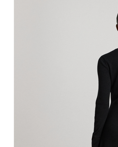 A timeless addition to your cool-weather wardrobe, this crewneck jumper dress features a midi-length A-line silhouette rendered in soft, worsted wool.