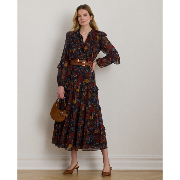 Showcasing painterly florals against a navy backdrop, this tie-neck dress unites a ruffle-trimmed tiered skirt with crinkle georgette for effortless movement with each step.