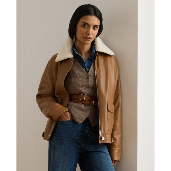 This luxurious take on the surplus-inspired bomber jacket features a lambskin leather shell and a removable, faux-shearling collar for versatile styling.