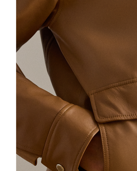 This luxurious take on the surplus-inspired bomber jacket features a lambskin leather shell and a removable, faux-shearling collar for versatile styling.