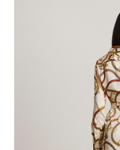 Crafted with smooth twill, this iteration of the classic shirtdress features a belted waist and an equestrian-inspired print that is quintessentially  Ralph Lauren Lauren.
