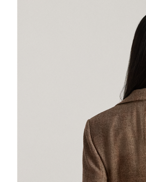 A wardrobe essential, this blazer is rendered in a soft cotton-and-wool blend yarn-dyed with a timeless Glen plaid pattern. Shoulder pads, waist darts and panel seams heighten this style's refined sensibility.