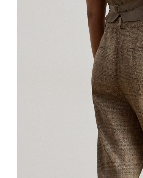 Cut for a cropped, slightly tapered silhouette, these stylish trousers are rendered in a soft cotton-and-wool-blend yarn dyed with a timeless Glen plaid pattern. Crisp creases, pleats and waist darts provide a tailored finish.