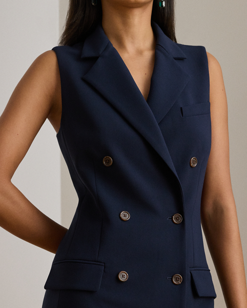 Drawing inspiration from Ralph Lauren Lauren's tailored blazers, this sleeveless dress features notch lapels and a double-breasted silhouette realised in stretch-infused double-faced crepe. "Lauren Ralph Lauren Lauren"-engraved horn-effect buttons complete the look.