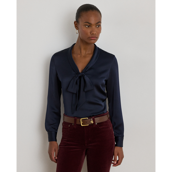 Crafted from satin charmeuse for a beautiful sheen and graceful drape, this blouse is distinguished by a tie-neck detail, which forms a voluminous bow on the front.