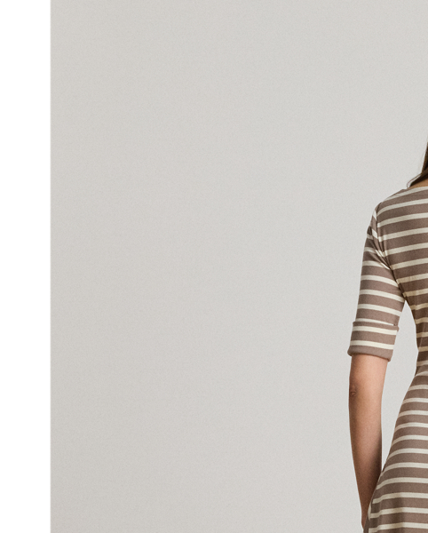 An enduring wardrobe essential, this striped boatneck midi dress with elbow-length sleeves is rib-knit from breathable stretch cotton for a comfortable fit and feel.