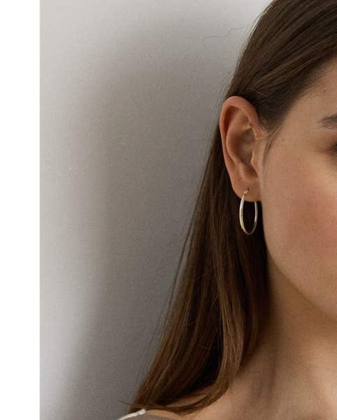 An enduring wardrobe essential, this striped boatneck midi dress with elbow-length sleeves is rib-knit from breathable stretch cotton for a comfortable fit and feel.