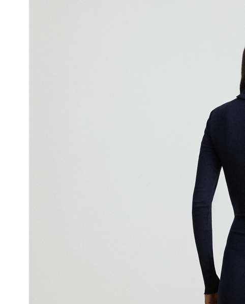 Rib-knit from a soft stretch-cotton blend, this roll neck dress is cut for a slim-fitting silhouette and a calf-grazing midi length. A tie-front design on the waist adds contemporary flare to this refined piece, while slits on the hem afford ease of movement.