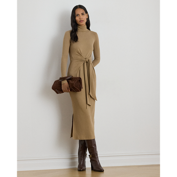 Rib-knit from a soft stretch-cotton blend, this roll neck dress is cut for a slim-fitting silhouette and a calf-grazing midi length. A tie-front design on the waist adds contemporary flare to this refined piece, while slits on the hem afford ease of movement.