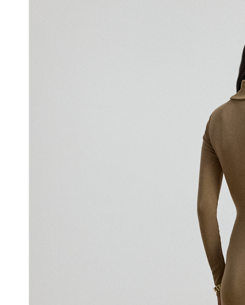 Rib-knit from a soft stretch-cotton blend, this roll neck dress is cut for a slim-fitting silhouette and a calf-grazing midi length. A tie-front design on the waist adds contemporary flare to this refined piece, while slits on the hem afford ease of movement.