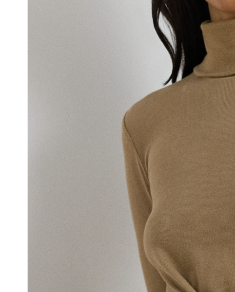 Rib-knit from a soft stretch-cotton blend, this roll neck dress is cut for a slim-fitting silhouette and a calf-grazing midi length. A tie-front design on the waist adds contemporary flare to this refined piece, while slits on the hem afford ease of movement.