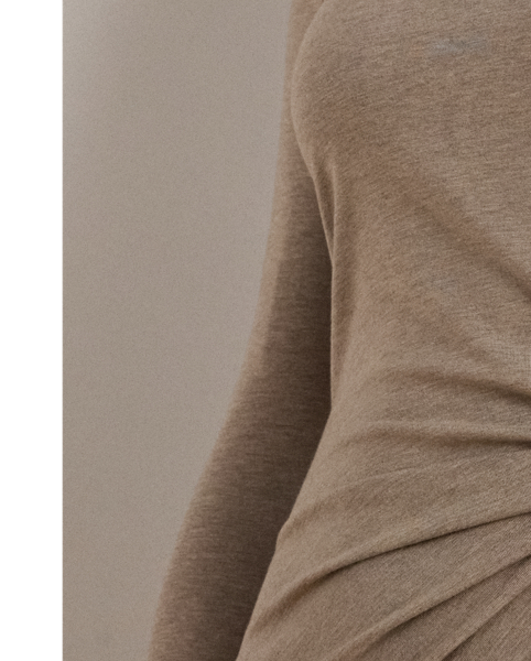 With a tie-front accent and soft stretch jersey, this midi dress can be easily dressed up or down.