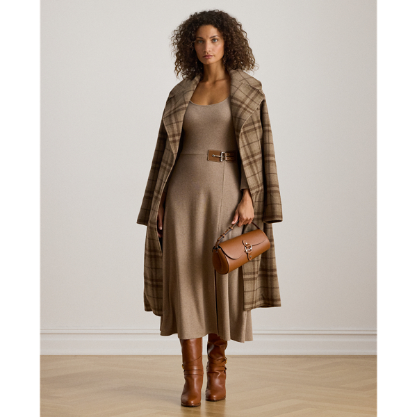 A rib-knit cotton blend brings subtle texture to this scoopneck midi dress, which is finished with a sumptuous, faux-leather buckled tab on the waist and a slit on the skirt for ease of movement.