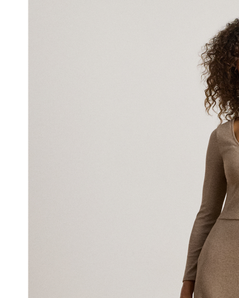 A rib-knit cotton blend brings subtle texture to this scoopneck midi dress, which is finished with a sumptuous, faux-leather buckled tab on the waist and a slit on the skirt for ease of movement.