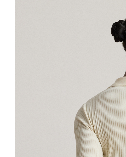 Quintessentially  Ralph Lauren Lauren, this version of the iconic Polo features long sleeves and a dimensional rib-knit construction. A tonal "LRL" logo on the hem completes the look.