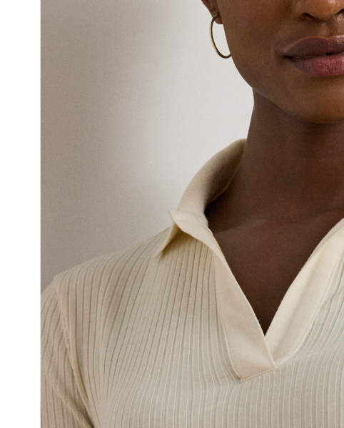 Quintessentially  Ralph Lauren Lauren, this version of the iconic Polo features long sleeves and a dimensional rib-knit construction. A tonal "LRL" logo on the hem completes the look.