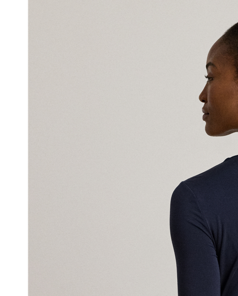 This elegant long-sleeve top features an asymmetrical neckline and a slim silhouette rendered in soft stretch jersey.