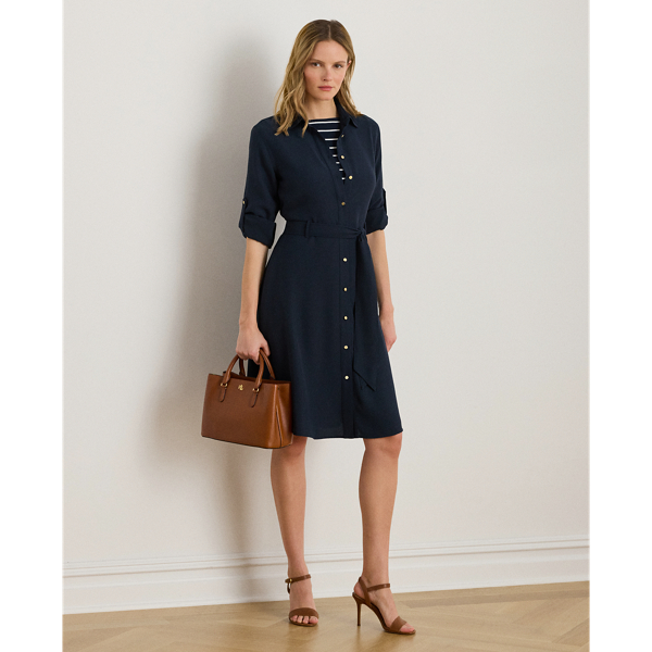 A belted waist enhances the fit-and-flare silhouette of this roll tab-sleeve shirtdress, which is tailored from fluid double-faced georgette.